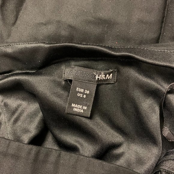 Black Dress with a Statement Flower - Picture 6 of 6